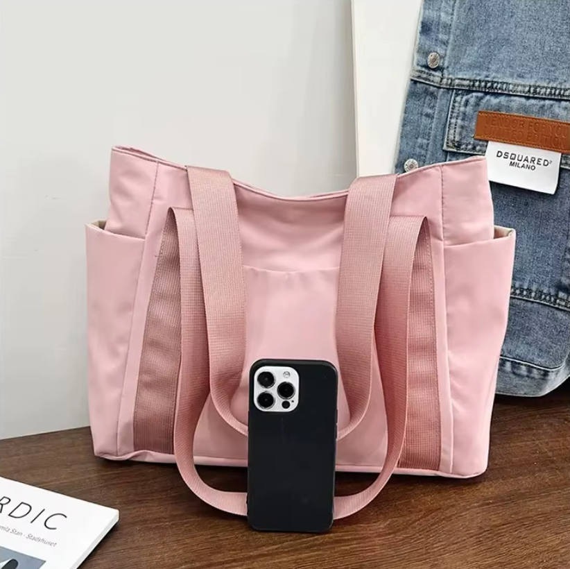 Sac à langer noir, rose ou violet élégant et pratique pour parents