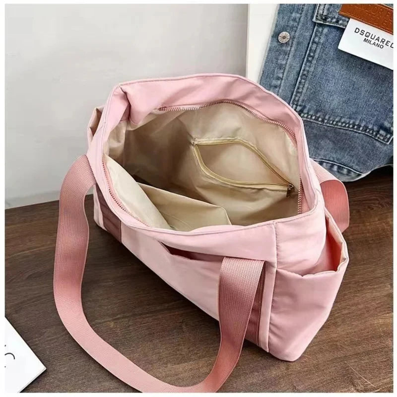 Sac à langer noir, rose ou violet élégant et pratique pour parents