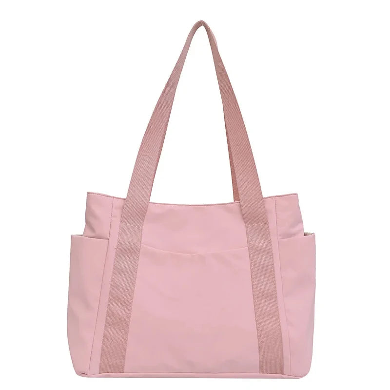 Sac à langer noir, rose ou violet élégant et pratique pour parents